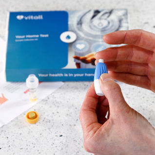 Hand collecting blood sample