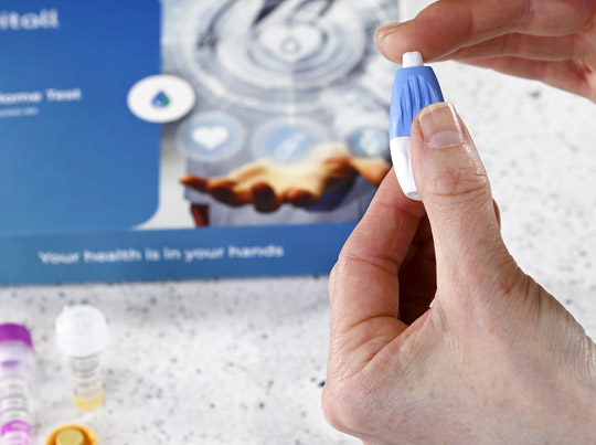 Customer collecting a blood-sample in the UK